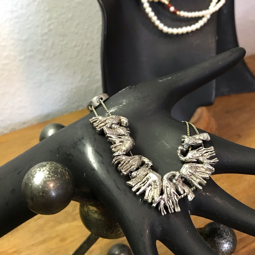 Silver toned giraffe charm bracelet